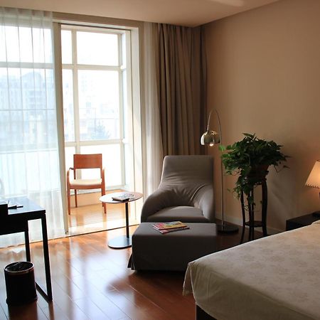 Green Park Hotel Tianjin Binhai  Quarto foto