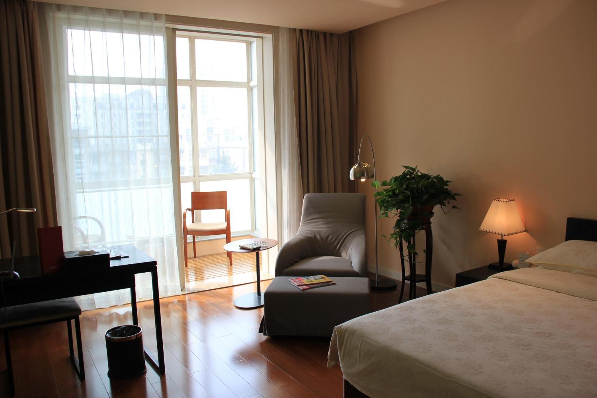 Green Park Hotel Tianjin Binhai  Quarto foto
