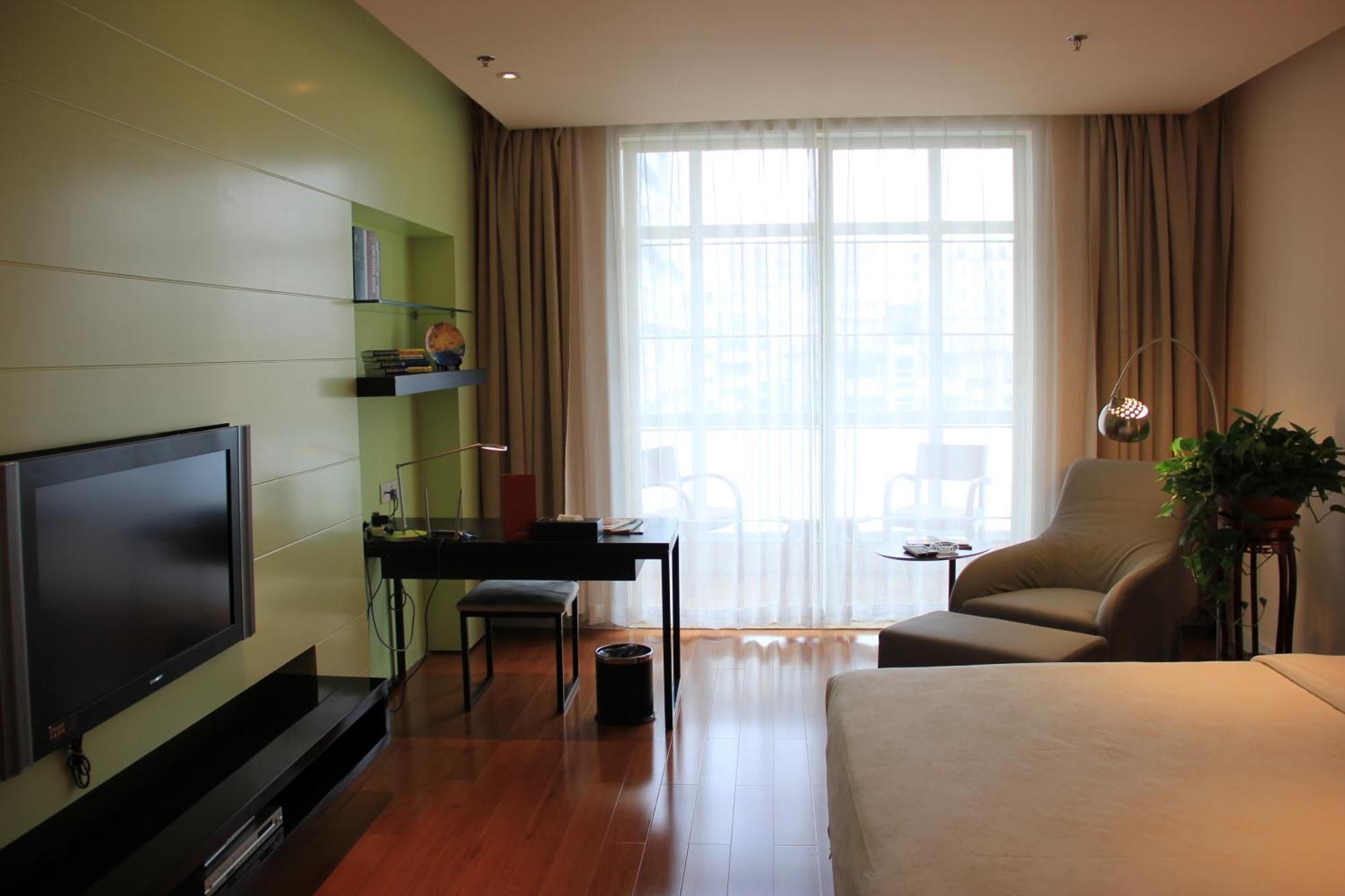 Green Park Hotel Tianjin Binhai  Quarto foto